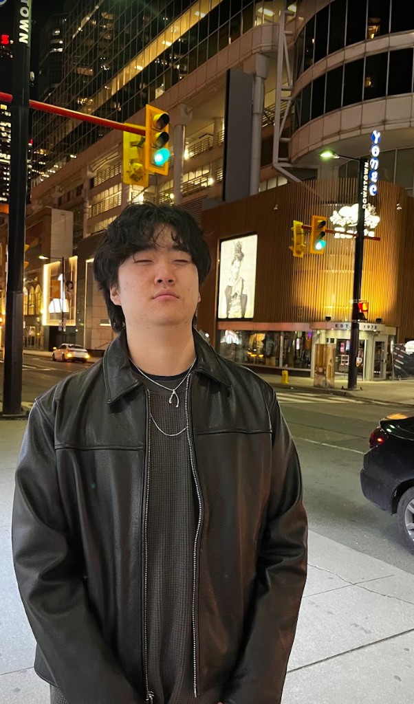 night portrait in a leather jacket on yonge street