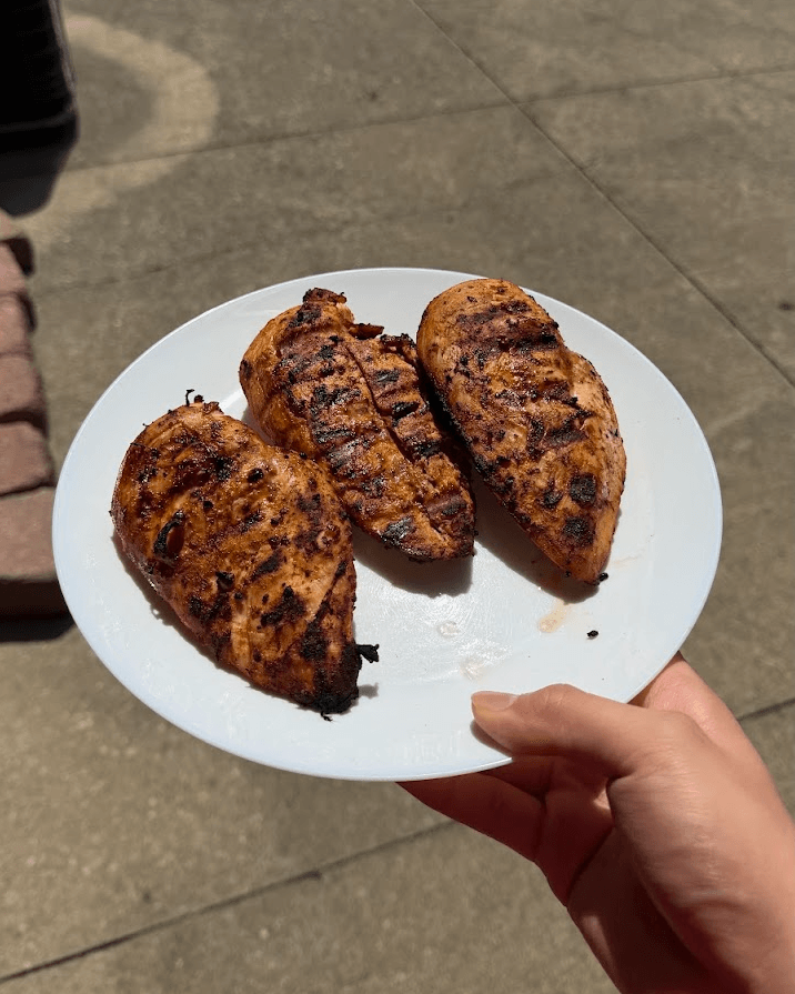 Grilled paprika garlic marinated chicken breasts on a plate